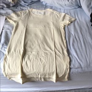 Reign storm long curved hem tee